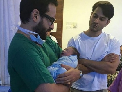 Unseen picture of Saif Ali Khan cradling Taimur minutes after his birth surfaces online | Unseen picture of Saif Ali Khan cradling Taimur minutes after his birth surfaces online