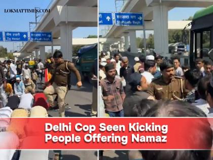 Delhi Police Personnel Seen on Video Kicking Muslims Offering Namaz on Road, Probe Ordered | Delhi Police Personnel Seen on Video Kicking Muslims Offering Namaz on Road, Probe Ordered
