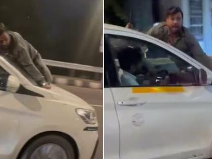 Mumbai: Cab Driver Drags Man on Car Bonnet for Several Kilometres After Violent Clash in Vile Parle (Watch Video) | Mumbai: Cab Driver Drags Man on Car Bonnet for Several Kilometres After Violent Clash in Vile Parle (Watch Video) Mumbai: Cab Driver Drags Man on Car Bonnet for Several Kilometres After Violent Clash in Vile Parle (Watch Video) | Mumbai: Cab Driver Drags Man on Car Bonnet for Several Kilometres After Violent Clash in Vile Parle (Watch Video)
