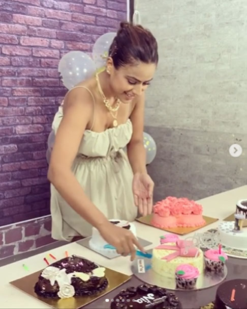 nia sharma birthday dress LONG BLACK DRESS WITH THIN SHOULDER STRAPS