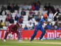 AFG vs WI: बदइंतजामी! रीप्ले 'स्क्रीन' पर ना देख सके खिलाड़ी, मैदान में घुस किरोन पोलार्ड से लिपटा दर्शक - Hindi News | Afghanistan vs West Indies, 1st ODI: fan with Kieron Pollard In Ekana Stadium | Latest cricket News at Lokmatnews.in