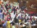 सपा-बसपा विधायकों ने राज्यपाल राम नाईक पर फेंके कागज के गोले, लगाए 'वापस जाओ' के नारे - Hindi News | Budget session of Uttar Pradesh Legislature Opposition members hurl paper balls governor Ram Naik | Latest india News at Lokmatnews.in