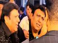 VIDEO: एक इवेंट में पैपराज़ी के साथ अपने सिक्योरिटी गार्ड की तीखी बहस के बाद गोविंदा ने माफ़ी मांगी - Hindi News | Video: Govinda Apologises After His Security Guard's Heated Argument With Paparazzo At Mumbai Event | Latest bollywood News at Lokmatnews.in