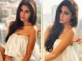 मौनी रॉय ने बालकनी में दिए कातिलाना पोज, सोशल मीडिया पर मची सनसनी - Hindi News | mouni roy looks sizzling in white off shoulder dress gave a killer pose in the balcony photos viral on internet | Latest bollywood Photos at Lokmatnews.in