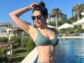 Karishma Tanna sets temparature soaring in a sexy grey bikini - Hindi News | Karishma Tanna sets temparature soaring in a sexy grey bikini | Latest entertainment Photos at Lokmattimes.com
