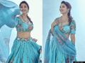 माधुरी दीक्षितने शेअर केला खास अंदाजातील फोटो, नेटिझन्सने दिल्या अशा कमेंट्स - Marathi News | Madhuri Dixit shared latest photos in blue lehenga images goes viral | Latest filmy Photos at Lokmat.com