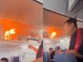 Flight Fire Video: आसमान में यात्री से भरा था विमान, अचानक लगी आग; अफरा-तफरी के बीच हुई इमरजेंसी लैंडिंग - Hindi News | Flight Fire Video plane full of passengers suddenly caught fire in sky an emergency landing was made amid the chaos | Latest weird News at Lokmatnews.in