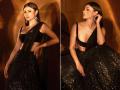 Mouni Roy looks gorgeous in black lehenga, see pics - Hindi News | Mouni Roy looks gorgeous in black lehenga, see pics | Latest entertainment Photos at Lokmattimes.com