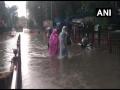 Mumbai rains: मुंबई में रात से लगातार भारी बारिश, मौसम विभाग ने जारी किया रेड अलर्ट, हाइटाइड का भी खतरा - Hindi News | Mumbai Rain Updates : Heavy Rain In City Leads To Waterlogging; red alert in city for two days | Latest india News at Lokmatnews.in