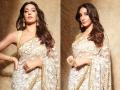 Nora Fatehi Photos: सफेद ट्रांसपेरेंट साड़ी में नोरा फतेही का स्टनिंग अवतार, देखें तस्वीरें - Hindi News | Nora Fatehi looks stunning in golden transparent saree see pics | Latest bollywood Photos at Lokmatnews.in