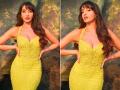 नोरा फतेही ने येलो गाउन पहने फ्लॉन्ट किया कर्वी फिगर, देखें एक्ट्रेस का किलर लुक - Hindi News | Nora Fatehi flaunts her curvy figure wearing a yellow gown see the killer look of the actress | Latest bollywood Photos at Lokmatnews.in