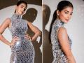Pooja Hegde Pics: शिमरी सिल्व्हर गाउनमध्ये पूजा हेगडे दिसली खूपच स्टनिंग, फोटोंनी चाहत्यांना केलं घायाळ - Marathi News | Pooja Hegde got her photoshoot done wearing a glass bodycon gown flaunted her curvy figure | Latest filmy Photos at Lokmat.com
