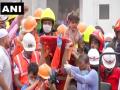 Maharashtra Raigad Building Collapse: बचाया गया चार साल का बच्चा, राहत जारी, अभी भी कई फंसे, see pics - Hindi News | Maharashtra Raigad Building Collapse  4 dead four-year-old among 78 rescued images viral see pics | Latest india Photos at Lokmatnews.in