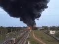Tamil Nadu Train Fire: डीजल ले जा रही मालगाड़ी में आग और 18 डिब्बे जलकर खाक, ट्रेन सेवाएं और 170 से अधिक विशेष बस सेवाएं बाधित, देखें हॉरर फोटो - Hindi News | Tamil Nadu Train Fire Goods carrying diesel catches fire 18 coaches burnt ashes services over 170 special bus services disrupted see horror photos Tiruvallur  | Latest india Photos at Lokmatnews.in
