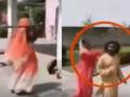दिल्ली के पास ग्रेटर नोएडा में ढोंगी बाबा की ज़बरदस्त पिटाई, Watch Viral Video - Hindi News | Fake Baba beaten up by women after alleging molestation, watch viral video | Latest crime Videos at Lokmatnews.in