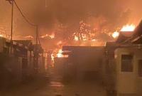 Moria refugee camp: दूसरी बार आग लगने के बाद खाक, सड़क के किनारे खुले में सोकर रात काटी, see pics - | Fresh fires burn at Greece's largest refugee camp Moria images viral see pics | Latest world Photos at Lokmatnews.in