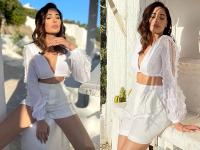 नरगिस फाखरीने व्हाईट ड्रेसमधील फोटो केले शेअर, दिसली खूपच बोल्ड आणि ग्लॅमरस, पाहा फोटो - Marathi News | nargis fakhri beating the summer heat with sizzling pics in white co-ord set see pics | Latest filmy Photos at Lokmat.com