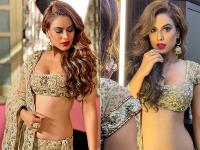 निया शर्मा ने लहंगे में कराया ग्लैमरस फोटोशूट, फ्लॉन्ट किया फिगर, देखें तस्वीरें - | Nia sharma stunning look in lehenga choli flaunts her sizzling figure see pics | Latest television Photos at Lokmatnews.in