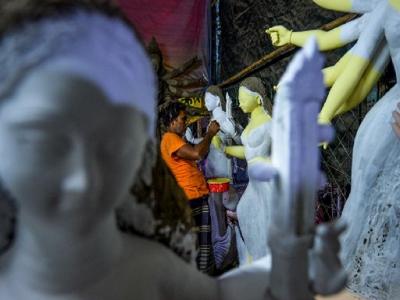 माता दुर्गा की मूर्ति के लिए 4 चीजें हैं सबसे जरूरी (फोटो-एएफपी) माता दुर्गा की मूर्ति के लिए 4 चीजें हैं सबसे जरूरी (फोटो-एएफपी)