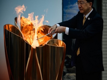 Coronavirus: Thousands flock to see Olympic flame in Japan despite COVID-19 fears | Coronavirus: खौफ के बावजूद जापान में ओलंपिक मशाल देखने उमड़े लोग, यहां देखें PICS
