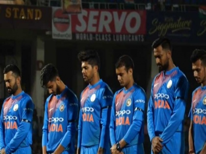 India vs Australia 1st T20: team india Tribute to martyrs in Pulwama attacksd during match | ऑस्ट्रेलिया के खिलाफ टी20 मैच में काली पट्टी बांध उतरी टीम इंडिया, पुलवामा शहीदों को दी श्रद्धांजलि