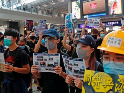 'An eye for an eye': Hong Kong protests get figurehead in woman injured by police | हांगकांग में प्रदर्शन तेजः चीनी शासन ने हिंसक प्रदर्शनकारियों के कदमों को “आतंकवादी के समान” करार दिया