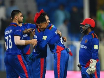 T20 World Cup Afghanistan spinner Mujeeb Ur Rahman scripts new record after 5-wicket haul vs Scotland | T20 World Cup: डेब्‍यू मैच में पांच विकेट, अफगानिस्‍तान के युवा स्पिनर ने रचा इतिहास, मुस्‍ताफिजुर रहमान से इस मामले में रह गए पीछे