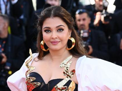 Cannes 2024 Aishwarya Rai Bachchan on red carpet style designer Falguni Shane black-golden gown even hand injury could not reduce the actress charm | Cannes 2024: ऐश्वर्या राय बच्चन ने रेड कार्पेट पर ढाया कहर, हाथ की चोट भी नहीं कम कर पाया एक्ट्रेस का जलवा