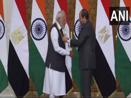 Egyptian President Abdel Fattah al-Sisi confers PM Narendra Modi with 'Order of the Nile' award, in Cairo | पीएम मोदी को मिस्र के सर्वोच्च राजकीय सम्मान 'ऑर्डर ऑफ द नाइल' से नवाजा गया, राष्ट्रपति अल-सीसी ने किया सम्मानित