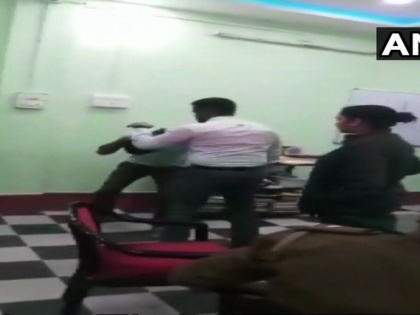 West Bengal: Alipurduar DM Nikhil Nirmal thrashing a youth for allegedly sending lewd messages to his wife, video goes Viral | वीडियो: DM ने दिखाई गुंडागर्दी, थाने में घुसकर युवक को पीटा