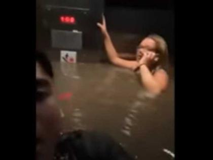 friends trapped in flooded elevator video goes viral on social media | बाढ़ की वजह से लिफ्ट में भरा पानी, मुश्किल फंसे लोग, इस तरह बचाई अपनी जान, वीडियो वायरल