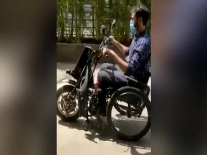 man did jugaad made a motorcycle to wheelchair anand mahindra thoughtful innovation watch the viral video | शख्स ने व्हीलचेयर से बना दिया मोटरसाइकिल, जुगाड़ देखकर आप भी हर जाएंगे हैरान, वीडियो शेयर कर आनंद महिंद्रा ने भी की तारीफ