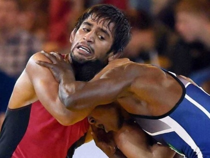 Bajrang Punia and Ravi Kumar lose semi-final bouts after sealing Olympic quotas | टोक्यो ओलंपिक के लिए क्वालिफाई करने के बाद बजरंग पूनिया की विवादास्पद हार, पक्षपातपूर्ण अंपायरिंग का लगाया आरोप