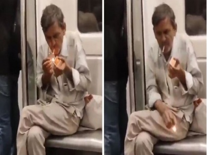 Delhi Metro: A video of an elderly smoking Veed goes viral | WATCH: दिल्ली मेट्रो में खुल्लम खुल्ला किसिंग के बीच अब... बीड़ी का स्वैग देखिए
