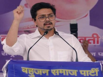 Lok Sabha Elections 2024 BSP supremo ex cm Mayawati blesses nephew Akash Mayawati's successor Know who he is watch video | Lok Sabha Elections 2024: बसपा सुप्रीमो ने भतीजे आकाश के कंधे पर हाथ रख दिया आशीर्वाद, मायावती के उत्तराधिकारी!, जानें कौन हैं, देखें वीडियो