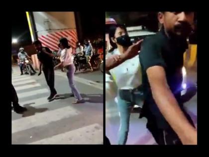 girl beat cab driver at red light in lucknow cctv video arrest deamand on twitter | यूपी में ट्रैफिक पुलिस के सामने कैब ड्राइवर को युवती ने पीटा, घटना का सीसीटीवी फुटेज आया सामने, लोगों ने लड़की को अरेस्ट करने की मांग की