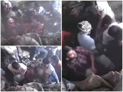 Delhi Violence cctv footage shows goons looting shop in bhajanpura north east delhi | दिल्ली: हिंसा की आड़ में उपद्रवियों ने दुकान लूटे, चोरी करते समय डंडे से फोड़ा CCTV, वीडियो हुआ वायरल