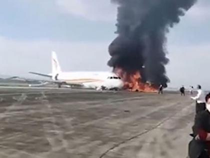 40 injured after passenger plane catches fire on runway in China's Chongqing | चीन में टेकऑफ के दौरान रनवे पर फिसला तिब्बत एयरलाइंस का विमान, लगी आग, 40 से अधिक यात्री अस्पताल में भर्ती
