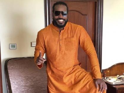 ipl 2018 chris gayle shared saffron kurta image on instagram user said looking Gujarati | केसरिया कुर्ते में क्रिस गेल ने जीता हिंदुस्तानियों का दिल, गदगद इंडियन यूज़र ने कहा- गुजराती लग रहे हो