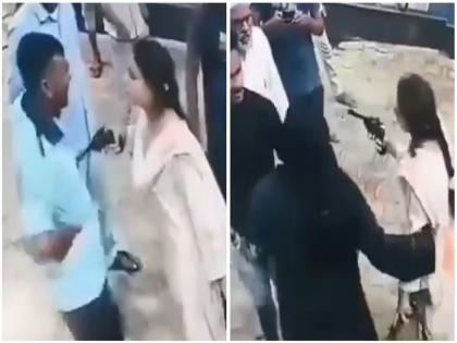 A Woman aims revolver at salesman's chest in Hardoi UP | VIDEO | 'इतनी गोली मारूंगी कि घरवाले भी पहचानने से इनकार कर देंगे': महिला ने CNG पंपकर्मी के सीने पर तान दी रिवॉल्वर | VIDEO A Woman aims revolver at salesman's chest in Hardoi UP | VIDEO | 'इतनी गोली मारूंगी कि घरवाले भी पहचानने से इनकार कर देंगे': महिला ने CNG पंपकर्मी के सीने पर तान दी रिवॉल्वर | VIDEO