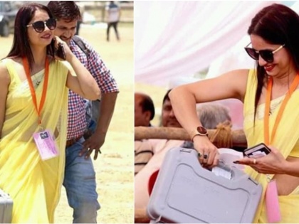 who is woman polling officer in yellow saree photo viral 100 percent voting | जानिए कौन है पीली साड़ी वाली महिला पोलिंग ऑफिसर, क्या है वायरल फोटो का सच