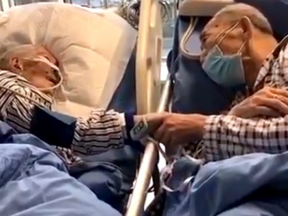 Coronavirus last goodbye of this elderly couple will make you cry watch viral video | Coronavirus: इस बुर्जुग दंपति का आखिरी गुडबाय आपको रूला देगा, देखें वायरल वीडियो