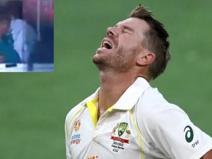 David Warner sneeze Faces Pangs Pain Video Goes Viral Rib Soreness While Sneezing ashes day night test | कुर्सी से नीचे गिरे डेविड वार्नर, कार्यवाहक कप्तान स्टीव स्मिथ और कोच घबराए, वीडियो हुआ वायरल