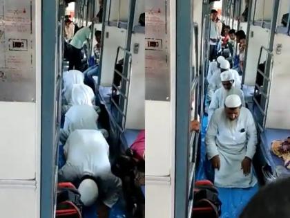 Kushinagar Namaz offered in train sleeper coach and meanwhile passangers stopped to move from one place to another video goes viral | देखें: ट्रेन के स्लीपर कोच में सामूहिक नमाज पढ़ने का वीडियो वायरल, नमाज के दौरान यात्रियों को आने-जाने से रोका गया Kushinagar Namaz offered in train sleeper coach and meanwhile passangers stopped to move from one place to another video goes viral | देखें: ट्रेन के स्लीपर कोच में सामूहिक नमाज पढ़ने का वीडियो वायरल, नमाज के दौरान यात्रियों को आने-जाने से रोका गया