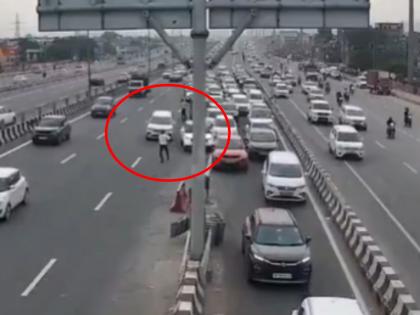 video viral Car hits traffic policeman on Delhi-Meerut Expressway policeman jumps in air hair-raising | VIDEO: दिल्ली-मेरठ एक्सप्रेसवे पर कार ने मारी ट्रैफिक पुलिस को टक्कर, हवा में दूर उछला पुलिसकर्मी; रौंगटे खड़े करने वाला CCTV वायरल