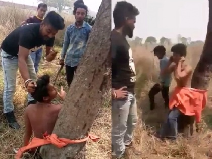 Uttar Pradesh Deoria people group brutally beaten a man video viral, up police arrested one accused | योगी आदित्यनाथ के "उत्तम प्रदेश" में पेड़ से बांध युवक की बेरहमी से पिटाई, वीडियो वायरल
