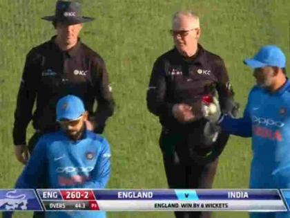 MS Dhoni Reveals why he took ball from umpire at the end of the third ODI vs England | धोनी ने किया खुलासा, इंग्लैंड के खिलाफ तीसरे वनडे में हार के बाद क्यों ली थी अंपायर से गेंद