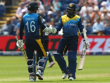 ICC World Cup, SL Vs NZ: Sri Lankan skipper Dimuth Karunaratne equals 20-year-old World Cup record | SL vs NZ: श्रीलंकाई कप्तान ने रचा इतिहास, टीम के 136 रन पर आउट होने के बावजूद तोड़ा 20 साल पुराना रिकॉर्ड