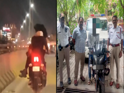 Viral Video Man rides bike with a woman on his lap in bengaluru booked | Viral Video: महिला को गोद में बैठाकर बाइक चला रहा था युवक, स्टंट मारना पड़ा भारी, पुलिस ने किया गिरफ्तार, देखें