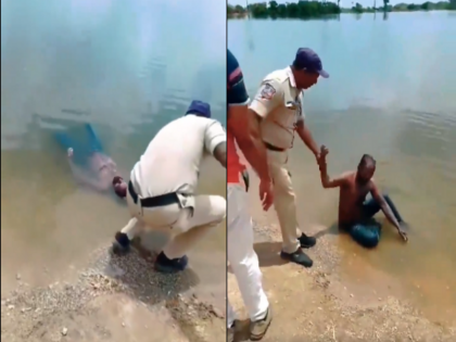 Viral Video Dead body found stuck river police took it out man stood up escape the heat | Viral Video: नदी में किनारे पर अटकी मिली 'लाश', पुलिस ने निकाला तो उठकर खड़ा हो गया शख्स, मामला जानकर सिर पकड़ लेंगे